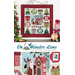 Photo collage of the finished wall hanging for December made with the Wander Lane fabric collection and pattern by Nancy Halvorsen