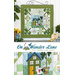 Photo collage of the finished wall hanging for March made with the Wander Lane fabric collection and pattern by Nancy Halvorsen