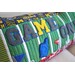 Close up image of machine embroidered letters that say GAME ON!