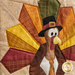 Close up photo of the finished paper piecing block showing stitching and fabric details of a cartoon turkey wearing a tie and capotain