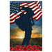 Panel of a soldier coming home, lifting a child up into the air. Behind them, a sunrise and a billowing american flag. A splash of red poppies distinguishes the foreground.