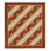 Photo of the Reflections of Autumn Log Cabin Throw Quilt made with orange, brown, and cream fabrics isolated on a white background
