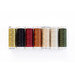 Photo of 7 spools of thread in green, gold, cream, red, and black, isolated on a white background