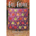Fall Foliage pattern front cover, the final quilt in purples, greens, oranges, yellows, and reds, held up in a gorgeous autumn scene of colorful trees and fallen leaves