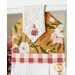 Close up photo of a white kitchen towel with floral and gingham fabrics