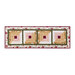 Photo of a table runner made with log cabin blocks and cream, yellow, green, and red floral fabrics isolated on a white background