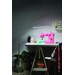 floor lamp next to a pink sewing machine on a desk