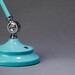 detailed view of LED lamp base in turquoise color