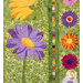 Close up photo of a floral quilt showing applique details of large pink, purple and yellow daisies with a patchwork green background