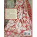 Back of Sew In Love, showing the same quilt from the front cover tastefully draped 