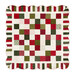 Photo of a green, red, and cream Christmas-themed quilt isolated on a white background