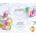 Scattered patchwork pocket prayer hearts over the white fabric panel