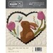 Front of pattern with finished heart featuring a woolen butterfly about to land on the bunny's nose, framed with flowers, so sweet and cute
