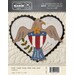 Front of pattern with finished heart featuring a brown eagle and a patriotic crest 