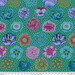 image of fabric that is vibrant teal, aqua, green, and magenta flowers over an aqua polka dotted teal fabric