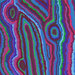 close up image of Fabric featuring vibrant teal, aqua, green, pink, and purple irregular striations that mimic Jupiter