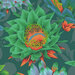 Close up of Fabric featuring vibrant green, blue, and orange cactus blossoms over a forest green background