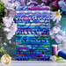 Photo of fabrics in the Lake FQ set from the Kaffe Fassett Collective Plus collection stacked on a white table surrounded by blue and purple flowers