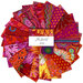 Photo of pink and red coordinating fabrics from the Kaffe Fassett Collective Plus collection fanned out in a circle