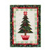 Photo of a Christmas quilt featuring a large potted pine with a star on top, isolated on a white background