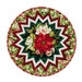 Photo of a Christmas table topper made with green, red, and white floral fabrics, isolated on a white background