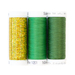 Photo of two green thread spools and a gold thread lined up next to each other isolated on a white background
