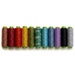 Row of thread spools in a rainbow of colors isolated on a white background