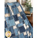 Photo of the Lakeside Gatherings Flannel Rag Quilt draped over a chair next to a wooden end table with stacked books and a plant on top
