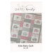 Front of the pattern showing about two thirds of the finished quilt, in gentle pinks and greys