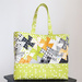 A variation of the tote in green, black, and orange