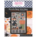 Front of pattern showing a digitized version of the finished project staged on white paneling with pumpkins and candy corn for effect and a blue gingham header