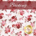 fabric with red and pink flower clusters with tan leaves on a cream background with a red banner at the top that reads 