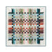 Photo of a quilt made with natural colors in a woven pattern isolated on a white background