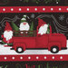 Close up of fabric featuring gnomes n a red truck hauling Christmas trees