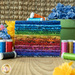 A stacked set of rainbow fabrics from the Prism II 23 FQ Set.