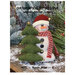 Front cover of the pattern showing the snowman and christmas tree staged on a wooden tabletop among pine branches and dusty faux snow.