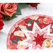 A shot of half of the round potholder, staged with roses on a white countertop.