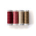 Photo of brown and red threads next to one another on a white background