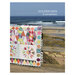 The front of the Golden Days book by Jen Kingwell showing a colorful quilt with floral and geometric designs