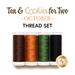 Four spools of thread in brown, orange, green, and black labeled 'Tea & Cookies for Two - October Thread Set'.