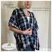The anytime topper in a black, white, and navy plaid fabric
