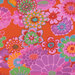 Close up of Fabric featuring multicolor modern florals on a tomato red background.