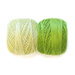 Two spools of thread, one pastel green and one bright grass green, sit side by side on a white background.
