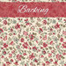 Cream fabric with a pattern of tossed red, pink, and teal florals with green leaves and vines. A raspberry-red banner reads 