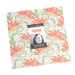 A photo of one floral orange and green fabric in a Moda layer cake shown in its packaging featuring the collection name Tango.
