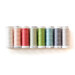 Eight spools of thread arranged in rainbow order, isolated on a white background.