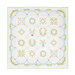 The completed Hope Blooms quilt in white, cream, blue, pink, and green, isolated on a white background.