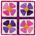 The completed May wallhanging in bright pink and purple, isolated on a white background.
