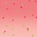 A medium pink ombre fabric with a few scattered red and gold hearts