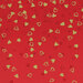 Dark red ombre fabric with scattered dark red and gold hearts all over